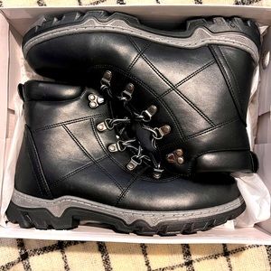 Women’s winter/Hiking Boots size 9 NWT and in box. Black. Waterproof.